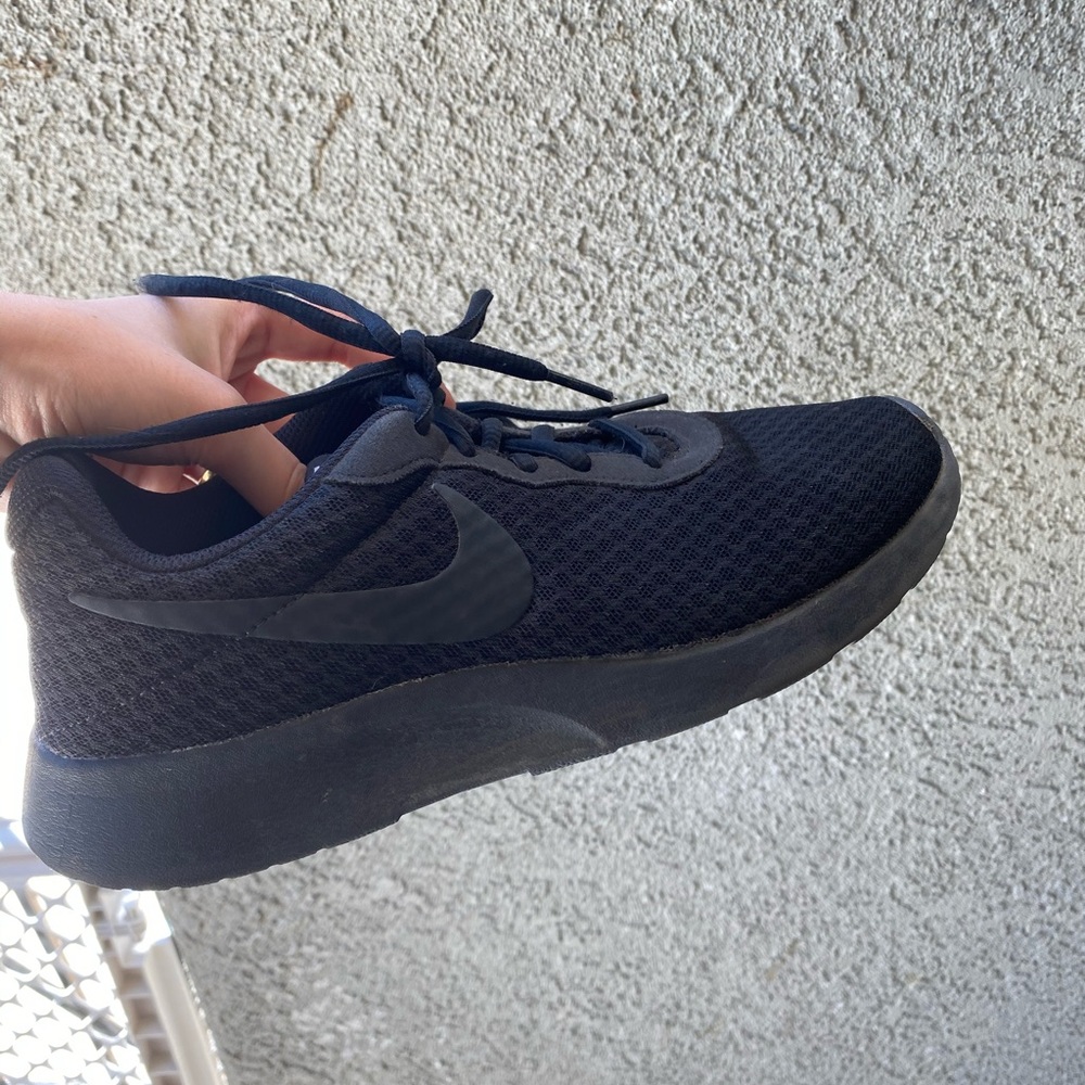 Black Nike running shoes